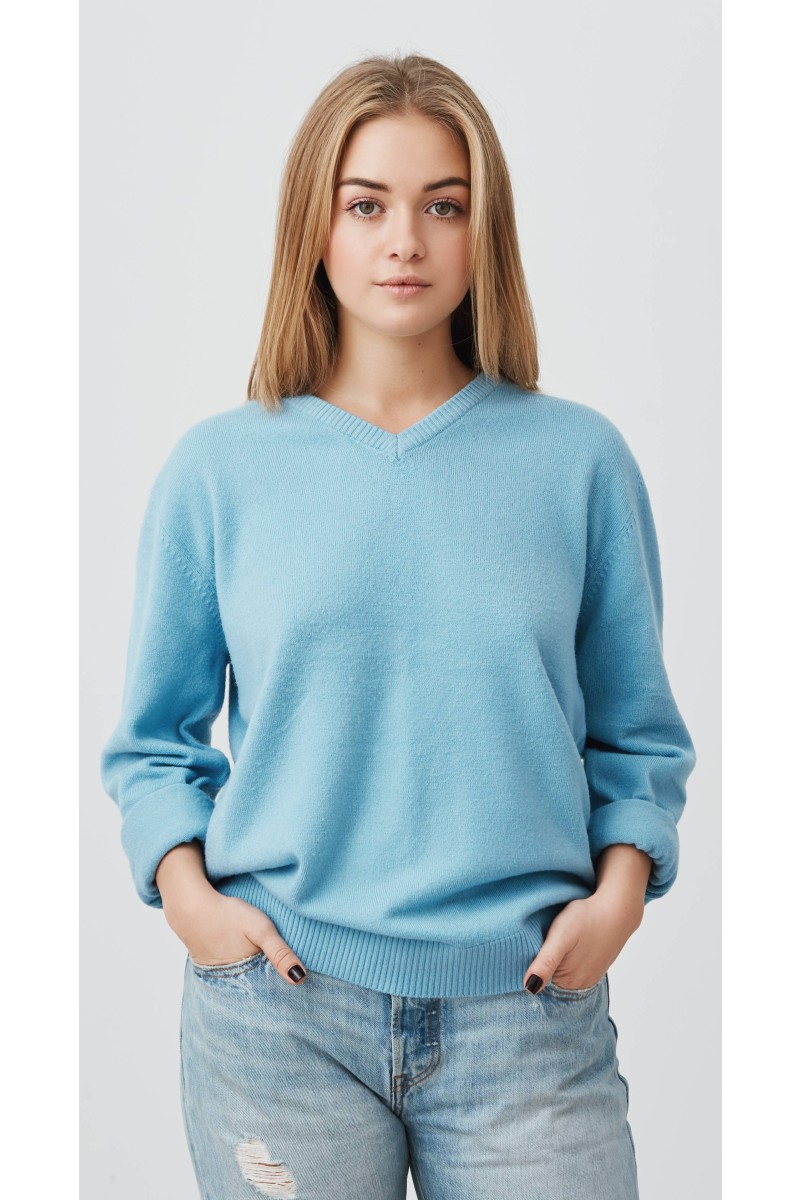 young-tender-fair-haired-teenage-girl-with-healthy-skin-wearing-blue-top-looking-with-serious-pensive-expression-caucasian-woman-model-with-hands-pockets-posing-indoors-1-2.jpg
